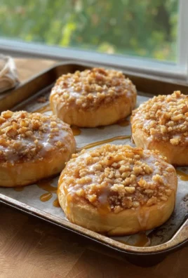 Apple Cheesecake Buns with a Crumble Topping and Sweet Glaze