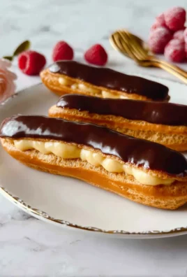 Exquisite Eclairs with Silky Custard Sauce: A Classic French Deligh