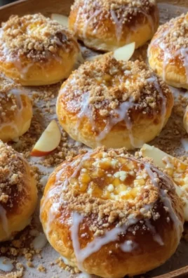 Apple Cheesecake Buns with a Crumble Topping and Sweet Glaze