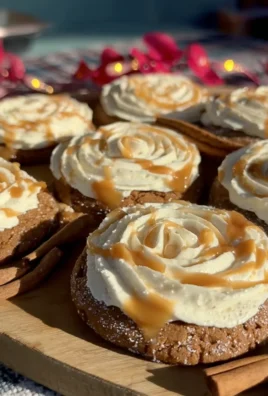 Soft Gingerbread Cookies topped with Vanilla Bean Buttercream Frosting and Salted Caramel