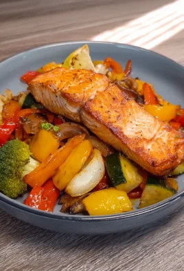Roasted Vegetables topped with Cooked Salmon