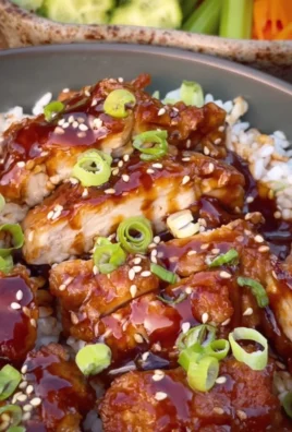 Crispy chicken thighs with a sticky teriyaki sauce